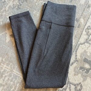 Athleta Salutation Stash Pocket II 7/8 Tight